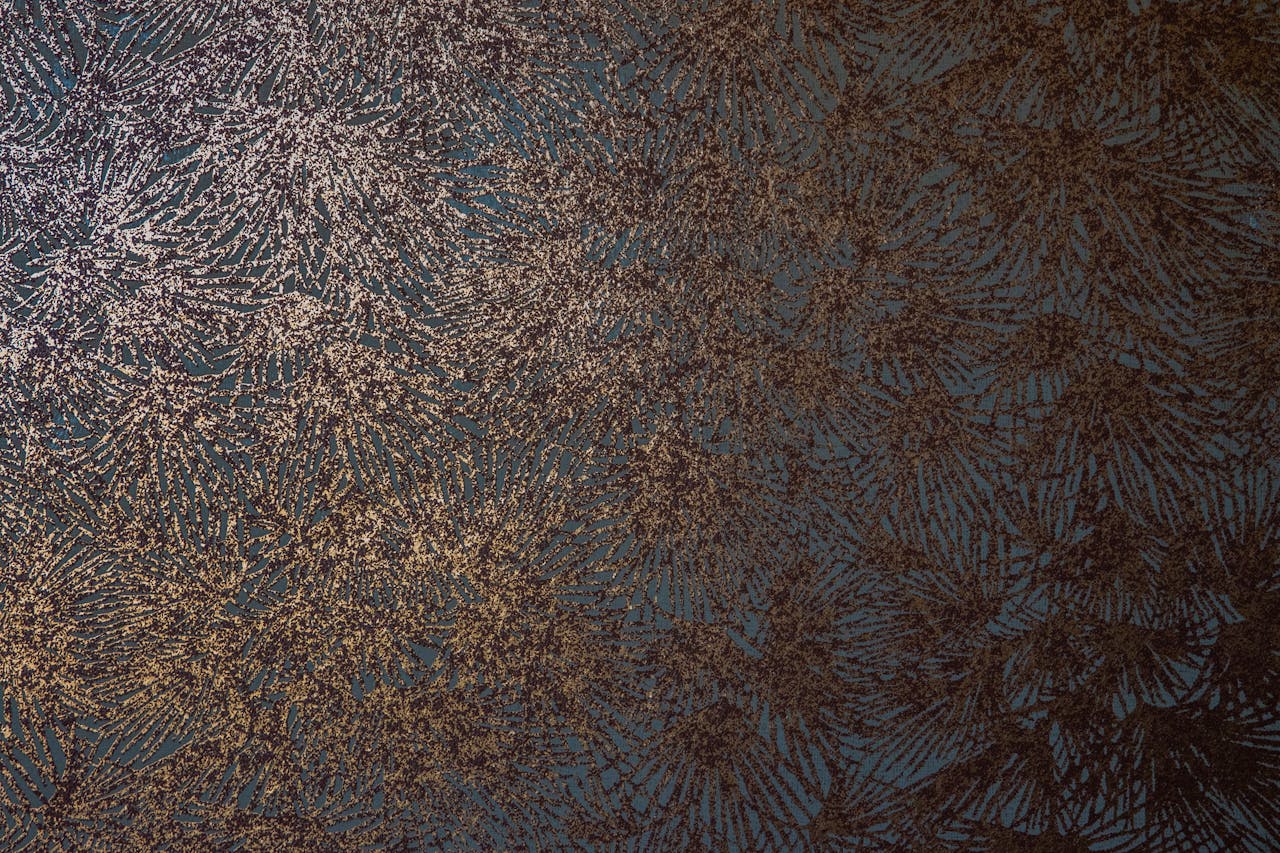 services-06 A textured abstract design featuring metallic accents on a dark background, ideal for artistic decor.